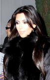 th_74947_celebrity-paradise.com-The_Elder-Kim_Kardashian_2010-01-27_-_leaves_Dan_Tanas_7236_122_119lo.jpg