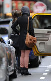 th_12046_Preppie_Olivia_Wilde_checking_out_of_her_hotel_in_London_15_122_150lo.jpg