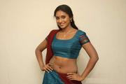 actress saree below navel photos