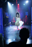Roselyn Sanchez as an exotic dancer dances in lingerie around stripper pole