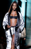 Naomi Campbell walks the runway in lingerie during the Dolce & Gabbana fashion show as part of Milan Fashion Week Spring/Summer 2009